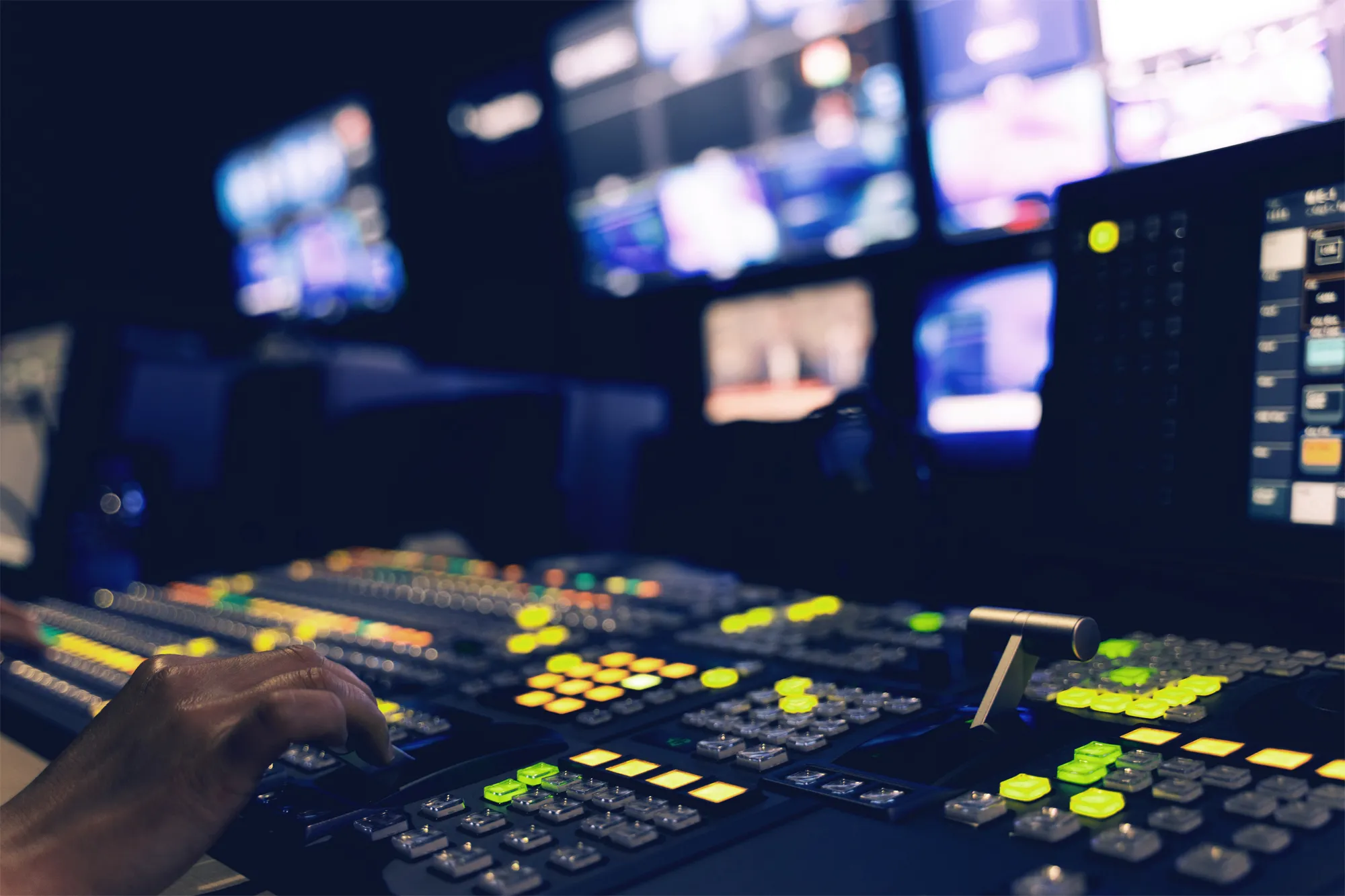 ESPN Netherlands broadcast control room with technicians monitoring live sports feeds on multiple screens.